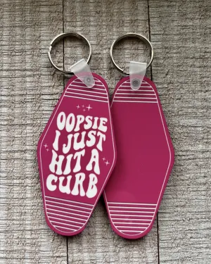 oopsie I just hit a curb | keychain